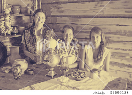 women having tea women having tea 35696183