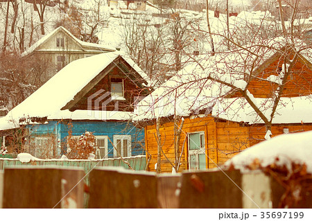 Snow house in winter dreamland at dawn in forest 35697199