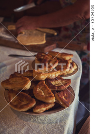 Grandmother bakes pies Grandmother bakes pies 35704959