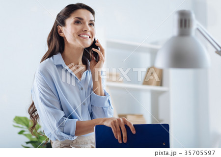 Beautiful smart businesswoman having a phone 35705597
