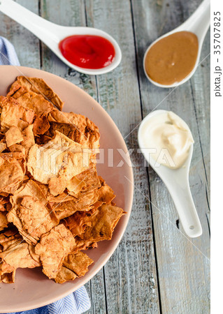 Snack for a party, healthy chips with a tortilla Snack for a party, healthy chips with a tortilla 35707825