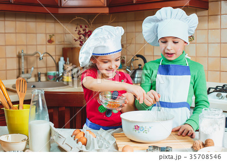 happy family funny kids are preparing the dough 35708546