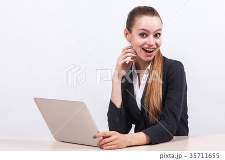 Picture of beautiful business lady working on PC Picture of beautiful business lady working on PC 35711655