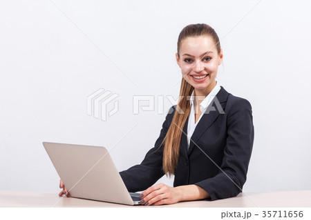 Picture of beautiful business lady working on PC Picture of beautiful business lady working on PC 35711656