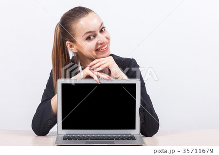 Picture of beautiful business lady showing PC 35711679