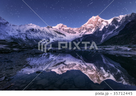 Himalayn mountains and mountain lake at night 35712445