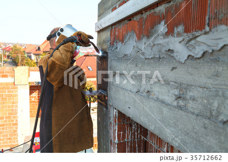 Working welding at the factory.  35712662