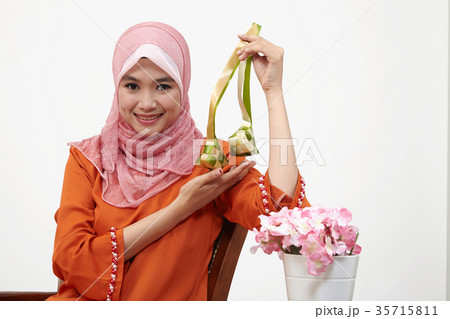 malay girl with tudung hoding ketupat 35715811