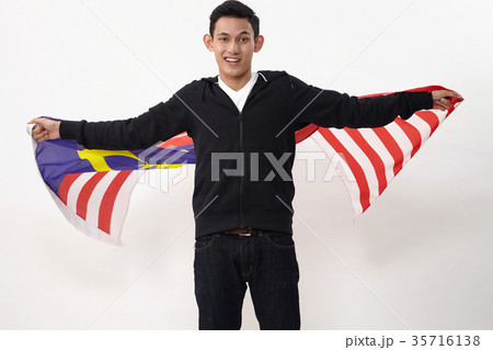 malaysian holding flag malaysian holding flag 35716138
