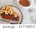 Chocolate cake and coffee cup on white sand backgr 35718853