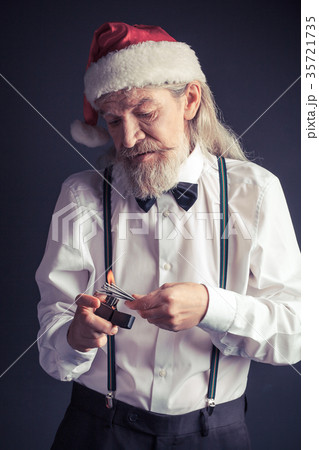 Office Santa setting fire for Bengal lights. 35721735