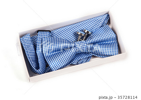 Close-up of cufflinks and bow tie fashion 35728114