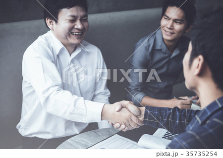 business partners handshaking  35735254