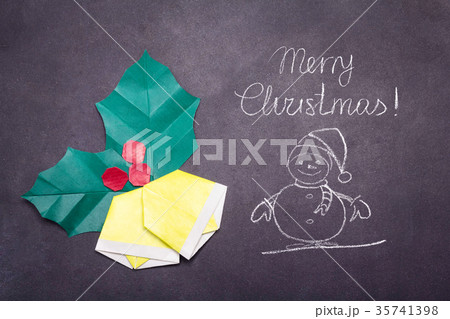 Chalk Merry Christmas text with origami bells 35741398