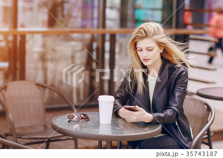 beautiful blonde in cafe beautiful blonde in cafe 35743187