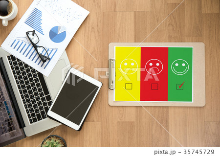 business man and woman select happy on evaluation? business man and woman select happy on evaluation? 35745729