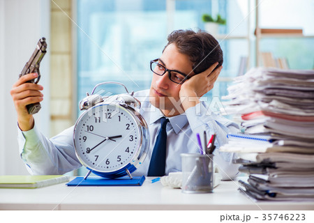 Angry businessman with gun thinking of committing 35746223