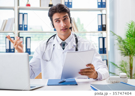 Young male doctor in telehealth concept 35747404