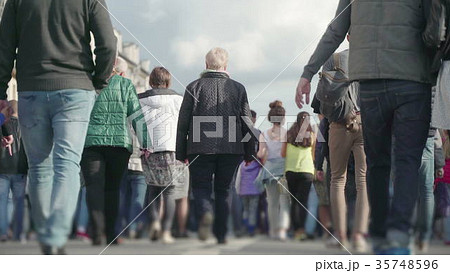 Concept of crowd unrecognizable people walking on 35748596