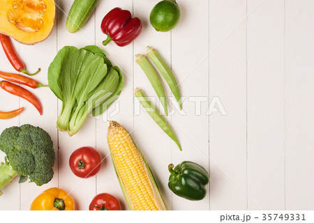 Assortment of the fresh vegetables on wooden Assortment of the fresh vegetables on wooden 35749331
