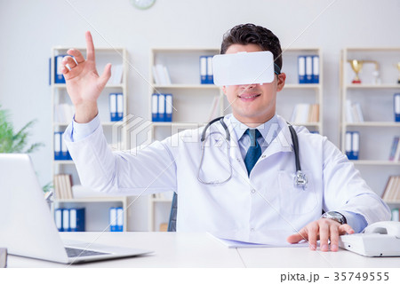 Young doctor with vr virtual reality headset 35749555