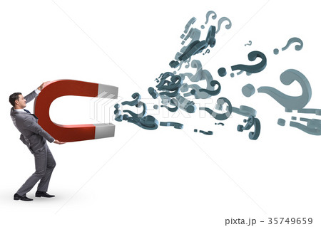 Businessman catching questions on horseshoe magnet 35749659