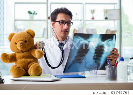 Baby radiologist with x-ray image Baby radiologist with x-ray image 35749762