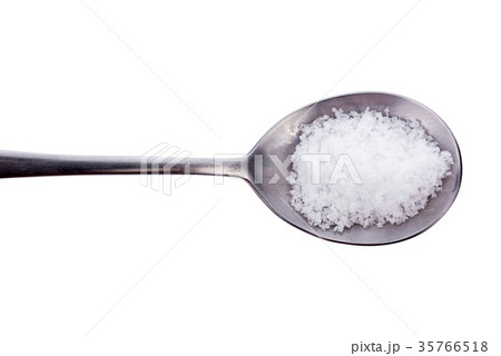 sea salt in spoon isolated on white background sea salt in spoon isolated on white background 35766518