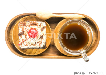 Top view of chocolate cake and a cup of coffee Top view of chocolate cake and a cup of coffee 35769300