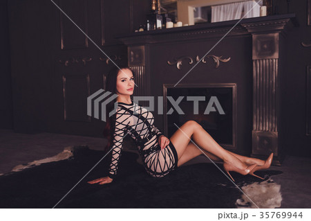 fashion portrait of young beautiful elegant rich woman 35769944