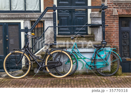 Bicycles in front of a House. 35770318
