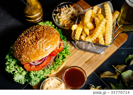 Tasty american beef burger with grilled meat 35770714