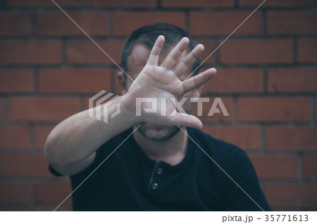 portrait one sad man standing near a wall portrait one sad man standing near a wall 35771613