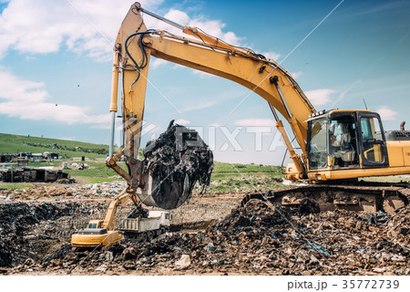 excavators and heavy duty machinery working excavators and heavy duty machinery working 35772739