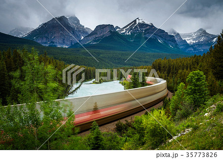 Train passing through Morant's Curve in Bow Valley Train passing through Morant's Curve in Bow Valley 35773826