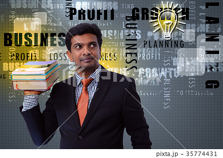 Business man with books Business man with books 35774431