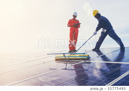 an engineer working on checking and maintenance 35775493