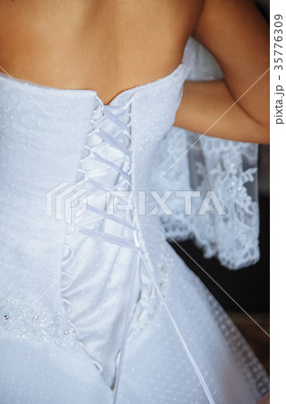 Wedding. Bride in a beautiful dress, close-up Wedding. Bride in a beautiful dress, close-up 35776309