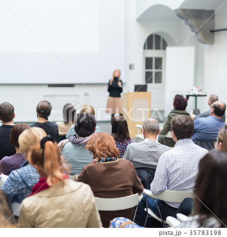 Woman giving presentation on business conference. Woman giving presentation on business conference. 35783198