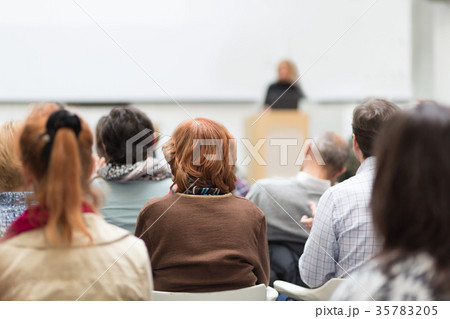 Woman giving presentation on business conference. Woman giving presentation on business conference. 35783205