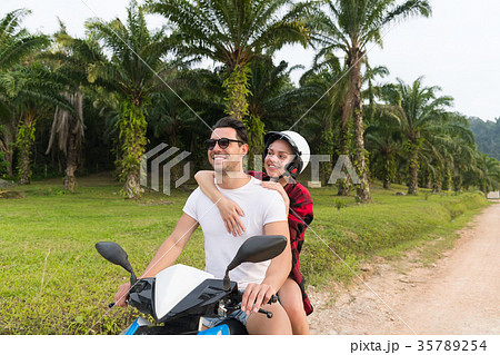 Couple Riding Motorbike, Young Man And Woman 35789254