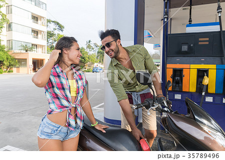 Couple On Gas Station Man Fuel Motor Bike, Happy 35789496