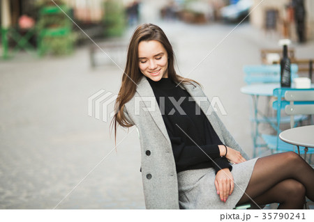 Portrait of a young beautiful woman in a urban Portrait of a young beautiful woman in a urban 35790241