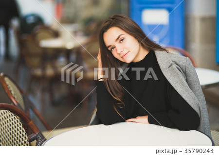 Portrait of a young beautiful woman in a urban Portrait of a young beautiful woman in a urban 35790243