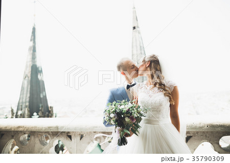 Gorgeous wedding couple in the old city of Lviv Gorgeous wedding couple in the old city of Lviv 35790309