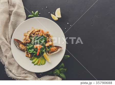 Warm salad with grilled seafood flat lay Warm salad with grilled seafood flat lay 35790688