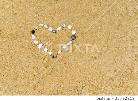 Seashells in the shape of a heart Seashells in the shape of a heart 35792818