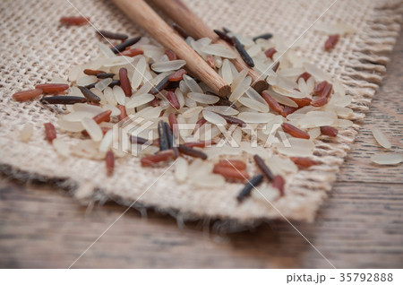 rice grain and chinese chopsticks rice grain and chinese chopsticks 35792888