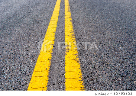 Yellow double dividing line  35795352