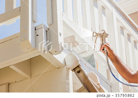 Professional House Painter Wearing Facial Protection Spray Paint 35795862